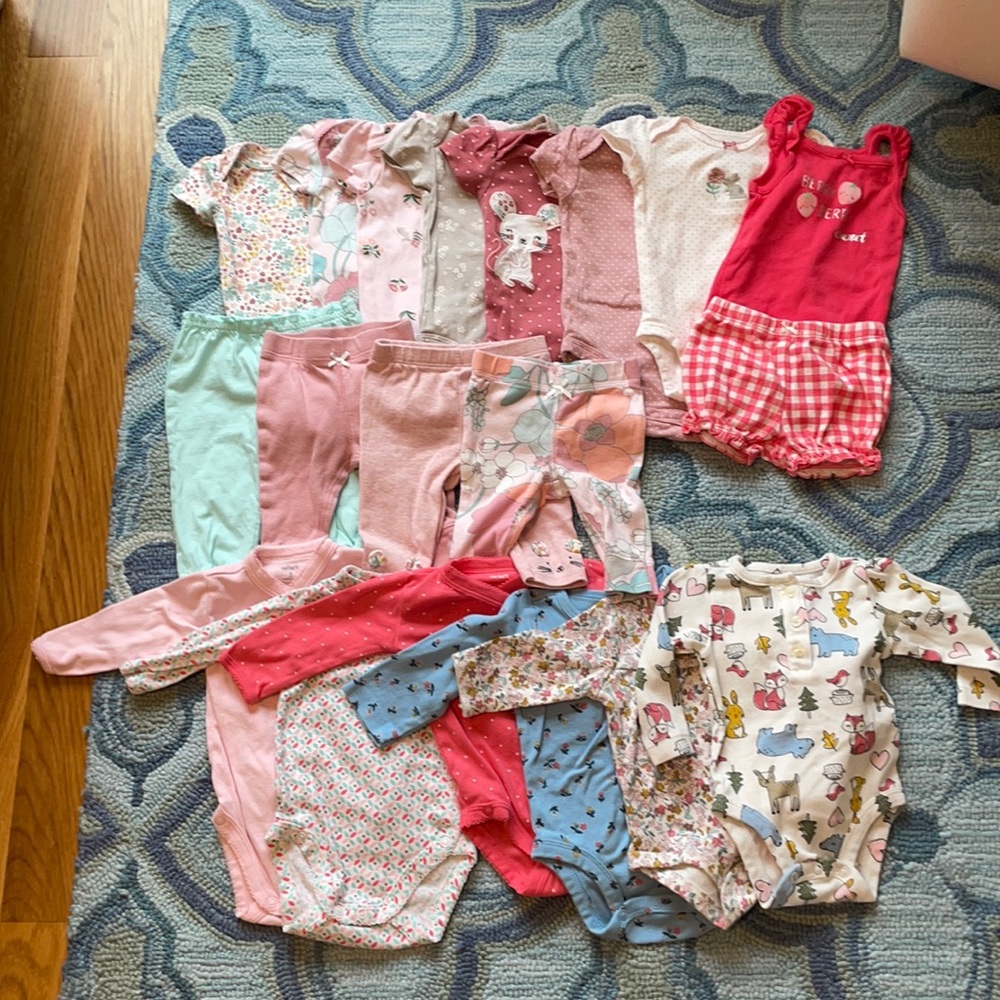Bundle of 0-3 size Carter’s onesies and pants